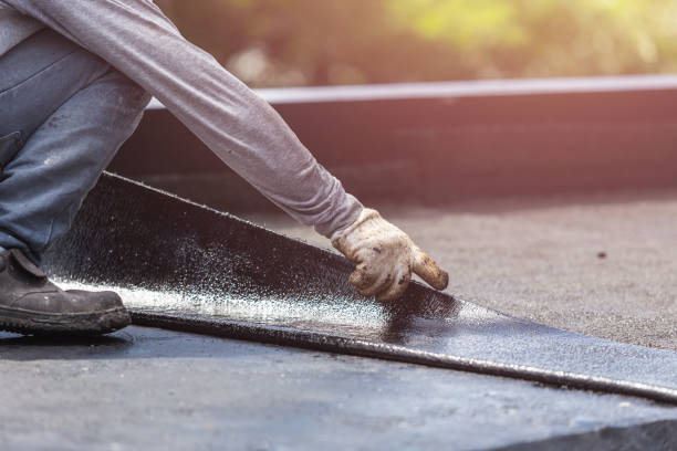 Professional Emergency Waterproofing technician working in Grand Blanc, MI